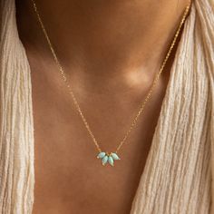 T U R Q U O I S E ∙ O P A L ∙ N E C K L A C E  Searching for a fresh, new look for the season? Our Turquoise Opal Marquise Necklace is the unique jewelry piece you are looking for! The floral design and enchanting turquoise gemstones make this pendant necklace a no brainer when it comes to a style refresh. * Material: High Quality Solid 925 Sterling Silver * Finish: 18K Gold ∙ Sterling Silver * Featuring ~15x8mm Marquise CZ Turquoise Opal Flower Pendant on a dainty Cable Chain, adjustable from 1 Gold And Turquoise Jewelry, Turquoise Jewelry Gold, Marquise Necklace, Rectangle Necklace, Necklace Opal, Small Necklace, Jewelry Birthday, Flower Pendant Necklace, Jewelry Lookbook