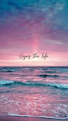 an ocean with the words enjoy the life above it