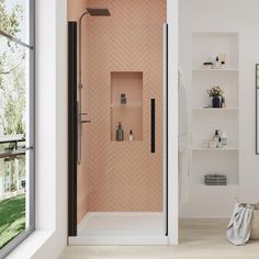 a bathroom with a walk in shower next to a window