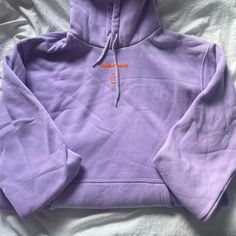 Purple Orange Comfy Sweatshirt Good Condition Popular Brand Lonely Ghost Trendy Purple Hooded Sweatshirt, Trendy Hooded Purple Sweatshirt, Trendy Purple Hoodie With Drawstring, Purple Relaxed Fit Hooded Sweatshirt, Casual Purple Sweatshirt With Letter Print, Trendy Lavender Cotton Sweatshirt, Purple Letter Print Hoodie Sweatshirt, Purple Hooded Cotton Sweatshirt, Purple Cotton Hooded Sweatshirt