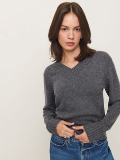 It's getting cold-ish. Shop the Dulce Cashmere V-neck Sweater, a sustainable sweater from Reformation. Sustainable Sweater, Leopard Print Boots, Work Wear Outfits, Cashmere Blend Sweater, Swimwear Dress, Vintage Inspired Dresses, Denim Mini Dress, Knit Pants, Outerwear Sweater