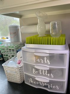 some plastic containers with toothbrushes in them