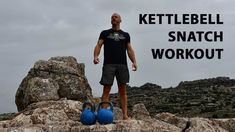 a man standing on top of a large rock next to two blue ballons with the words kettlebell snatch workout