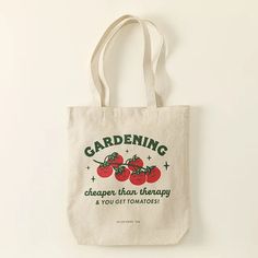 a tote bag that says gardening is cheaper than therapy, and you get tomatoes