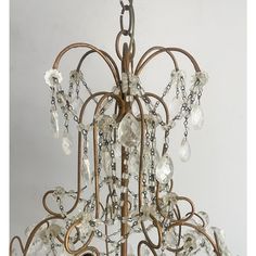 a chandelier with many crystal beads hanging from it