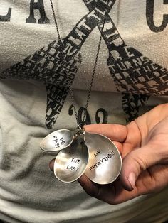 a person holding three spoons in their hands with the words eat the leftovers written on them