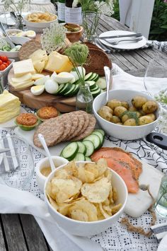 a table topped with lots of different types of food