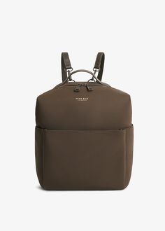 a brown backpack with two straps on the front