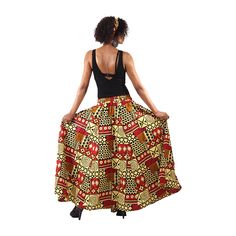 The Ankara Print Elastic Maxi Skirt is a long, flowing skirt that combines traditional African design with modern style. It's fitted with an elastic waist and includes straps for a bow tie, offering both comfort and a customized fit. The A-line cut with pleats and practical pockets add both elegance and utility, making it suitable for all your favorite occasions. This skirt comes with a matching head wrap, creating a complete look that is both vibrant and versatile. Features: Elastic waist with Ankara Print, Natural Body Care, Body Oils, Printed Maxi Skirts, Flowing Skirt, African Design, Natural Body, Head Wrap, Printed Maxi