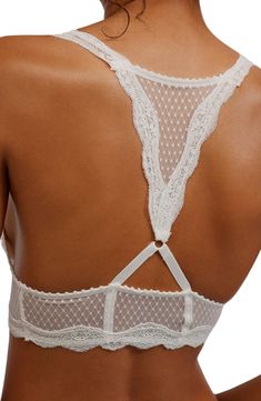 Scalloped lace and dotted mesh add a romantic feel to an unlined racerback bralette that's a perfect complement to styles with cutaway shoulders. Slips on over head Racerback 86% nylon, 14% spandex Hand wash, dry flat Imported Lace Camisole Bra With Lace Trim, Elegant Bra With Lace Bodice, Elegant Underwire Bra With Lace Bodice, Feminine Lace With Built-in Bra, Lace Bodice Bra For Weddings, Delicate Lace Bra With Lace Trim, Delicate Fitted Bra With Delicate Straps, Fitted Lace Bra With Lace Trim, Stretch Camisole Bra With Delicate Lace