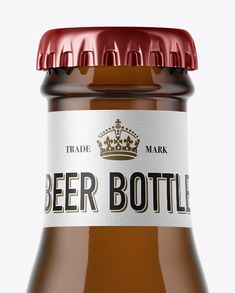 a bottle of beer with a red cap on the top is shown in front of a white background