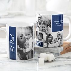 two coffee mugs sitting on top of a counter next to marshmallows