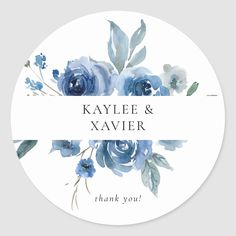 a round sticker with blue flowers on it that says,'thank you '