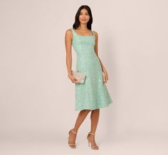 A square neckline and a fit-and-flare silhouette give this minty green women's midi dress a classic silhouette. The modern twist on the look is the pretty textured fabric: a tweedinspired boucle finished in sheer but shimmering sequins. The back zipper, princess seams, and a no-waist-seam construction give the bodice its sleek fit. Wear this cute sleeveless dress for a sparkly update on classic prim and polished style. Style Number: AP1E211650 Brand: ADRIANNA PAPELL Imported Dry Clean Main Fabri Plus Size Dresses Formal, Boucle Dress, White Bridal Dresses, Polished Style, Minty Green, Long Midi Dress, Midi Cocktail Dress, Princess Seams, Little White Dresses