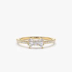 "Diamond Ring / Bow Ring / 14k Gold Baguette and Round Diamond Bow Ring / Dainty Bow Ring / Dainty Ring / Promise Ring by Ferkos Fine Jewelry Ferko's Fine Jewelry * Made to Order * Gold Kt: 14K (also available in 18K) * Available Gold Color: Rose Gold, Yellow Gold, White Gold * Round Diamonds: 22 pcs 1.0 MM * Round Diamonds: 1 pcs 2.0 MM * Baguette Diamonds: 6 pcs 2.5 x 1.4 - 2.5 x 1.3 MM * Diamond Carat Weight: 0.25 ctw * Diamond Color-Clarity: G Color VS/SI Clarity If you have any additional q Gold Rings With Baguette Diamonds For Anniversary, Gold Rings With Baguette Diamonds For Gift, 14k Gold Baguette Diamond Rings For Gifts, 14k Gold Baguette Diamonds Ring Gift, 14k Gold Rings With Baguette Diamonds For Gift, Baguette Diamond Rings For Gift, Round Cut, Gift Baguette Diamond Rings With Round Cut, Dainty White Gold Ring With Baguette Diamonds, Gold Baguette Cut Diamond Ring With Halo Design