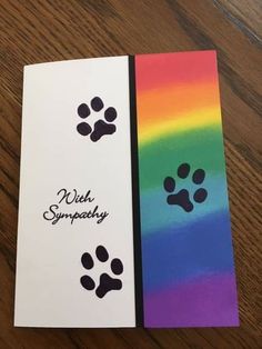 two cards with dog paw prints on them