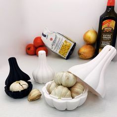 an assortment of ingredients including garlic, tomatoes and other foodstuffs