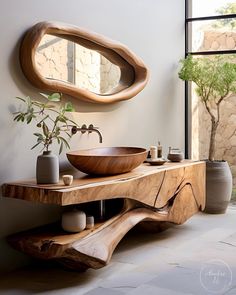 a bathroom with a wooden sink and mirror