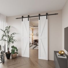 an empty living room with sliding doors and potted plants