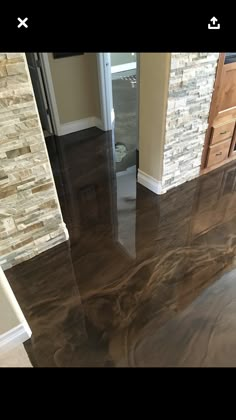 the floor is shiny and ready to be used in this home's new kitchen