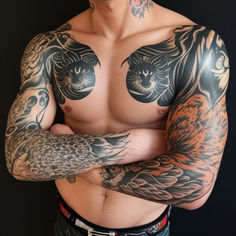 a man with tattoos on his chest and arms