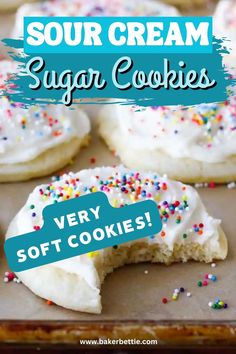 sugar cookies with white frosting and sprinkles