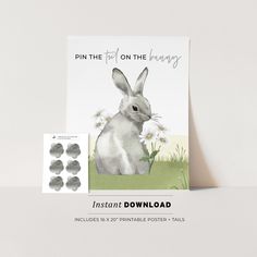 a card with an image of a bunny and daisies in the grass, next to it's envelope