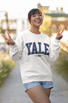 "Yale 1701 Sweater, Yale University Sweater, Yale University Hoodie, University Sweatshirt, Yale 1071 Hoodie ATTANTION PLEASE IF YOU WANT TO GET OVERSİZED MODEL, YOU SHOULD BUY 2-3 SIZE BIGGER THAN YOUR FIT SİZE. 🌟Example: Your fit size : M You Should buy : XL or 2XL  How to Order  1️⃣ Choose your Sweater  size from the \"Size\" drop-down list, 2️⃣ Choose your Sweater color  from the \"Primary Color\" drop-down list, 3️⃣ Please chose your design color from last image and than write it personali Christian Sweatshirts, Feminist Sweatshirt, Teachers Day Gifts, University Sweatshirts, Christian Sweatshirt, Meaningful Messages, Kindness Shirts, Mama Sweatshirt, Retro Shirts