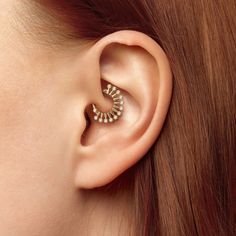 Add a unique edge to your everyday style with our 14k gold genuine diamond spiked daith ring! Materials: * 14K Solid Gold (Weight: 0.95g) - Available in yellow gold, rose gold or white gold. * Genuine or lab grown white diamond (Weight: 0.06ct VS-SI/G-H) Measurements:      Inner diameter: 5/16" - 8mm Outer diameter: 0.63" - 16mm Number of diamonds: 12 Diamond size: 1mm * Nickel free and hypoallergenic To keep your jewelry looking new, take a soft cloth or toothbrush with mild soap and gently bru Daith Ring, Daith Hoop, Daith Earring, Daith Rings, Daith Jewelry, Daith Earrings, Piercing Ring, Daith Piercing, Nose Hoop