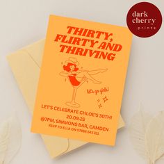 an orange birthday card with the words thirty, flirty and thriving on it