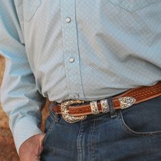 The Vogt Silversmiths selection of belts are fully hand tooled and made of American saddle leather. Our belts are lined in top grain leather for extra durability and are accented with fine stitching and hand rubbed edges. Available in 4 belt styles: 1-1/4" belt tapered to 3/4" 041-042 Pair with a 3/4" Vogt Sterling Silver Buckle Set 1-1/2" belt tapered to 1" 041-049 Pair with a 1" Vogt Sterling Silver Buckle Set 1-1/2" straight belt 041-044 Pair with an 1 1/2" Vogt Sterling Silver Buckle Set 1-1 Classic Concho Belt Buckles For Rodeo, Western Belt Buckles For Rodeo, Classic Hand Tooled Belt Buckles For Western-themed Events, Classic Concho Belt For Western-themed Events, Embroidered Leather Belt For Western-themed Events, Classic Belt Buckles For Western-themed Events With Belt, Leather Embroidered Belt For Western-themed Events, Leather Belt With Embroidery For Western-themed Events, Western Concho Belts For Ranch