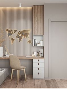 a room with a desk, chair and wallpaper on the walls that has a world map painted on it