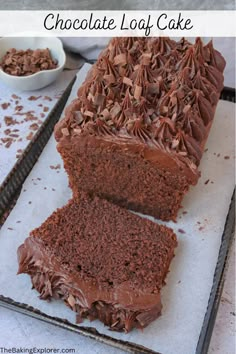 a loaf of chocolate cake sitting on top of a pan