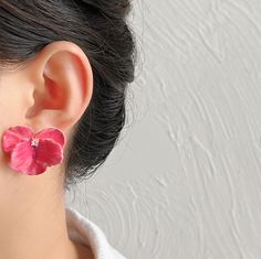 Elevate your style with our exquisite hand-painted enamel pink viola oleander earrings. Measuring 2.9cm x 2.8cm, these delicate floral-inspired earrings are a perfect blend of elegance and artistry. Crafted with precision and adorned with intricate detailing, these earrings capture the beauty of nature in every stroke. The soft pink hues create a harmonious balance between femininity and sophistication, making them a versatile accessory for any occasion. Add a touch of grace to your ensemble wit Pink Petal-shaped Earrings For Spring, Rose Red Flower Drop Earrings, Rose Red Flower-shaped Earrings, Rose Red Flower Earrings, Pink Birth Flower Earrings For Wedding, Rose Red Flower-shaped Earrings For Pierced Ears, Delicate Pink Birth Flower Earrings, Rose Gold Petal Earrings, Rose Red Flower Earrings For Pierced Ears