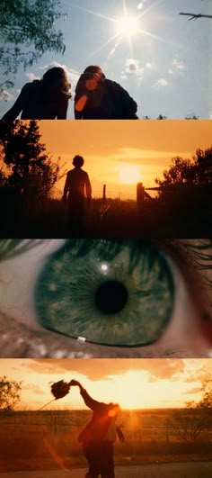 two people standing in front of an eye looking at each other with the sun setting behind them