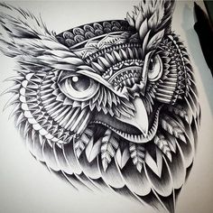 an owl tattoo design on paper