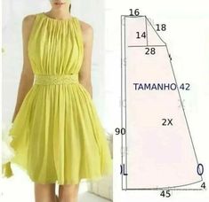 a woman is wearing a yellow dress and measurements