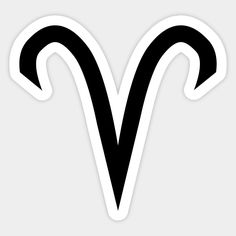 the black and white zodiac sign sticker is on a gray background with an arrow pointing up