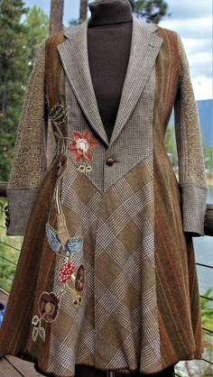 a coat with flowers and leaves on it