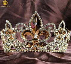 Imperial Medieval Pageant King Queen Full Tiara Crown Wedding Party Costumes   Description:   You are looking at a classic tiara crown. Sparkling Clear Genuine Austrian rhinestones are set on Gold-plated metal. 4 small loops at the bottom, can use hair clips to fix the crown. All rhinestones sparkle a lot and are prong set by hands! This piece is perfect for wedding, pageant, party, costumes or any special occasions. Thanks for looking!   Size:  Height: Approx. 4-1/4''(10.5cm)  Base Diameter: Ap Gold King Crown, Pageant Costumes, Queens Tiaras, Handmade Tiaras, Red Luxury, King Crown, Gold Tiara, Headband Jewelry, Princess Tiara