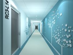 a long hallway with blue walls and white flowers on the wall