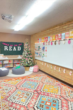 the room is decorated for christmas with colorful rugs