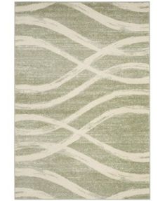 an area rug with wavy lines in green and white on the floor, along with a beige background