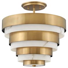 an image of a ceiling light fixture with white and gold accents on the rims