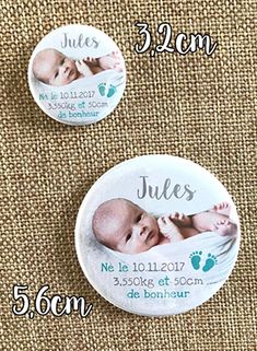 two buttons with the names of babies on them