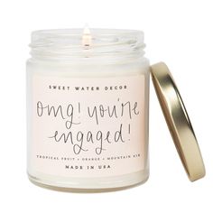 a candle that says, sweet water decor only you're engaged on the inside