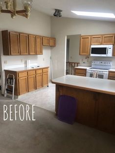 an empty kitchen with white appliances and wood cabinets in the foreground, before and after remodeling