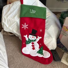 a christmas stocking with a snowman on it