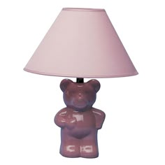 a brown teddy bear lamp with a pink shade on it's head and arms