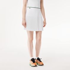 This tennis-style pleated skirt is simply iconic. A new take on a Lacoste classic, with an elasticated waist for comfort and precise laser finish. Sharp styling to give you a boost. Tennis Whites, Womens Pleated Skirt, 2024 Collection, Coat Dress, Sweater Skirt, Skirt Pants, Sports Women, Pleated Skirt, Shirt Jacket